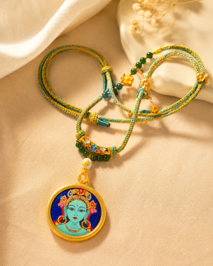 Green Tara Mineral-Sand Thangka Pendant | Calm & Grounding Symbol - Blessora gallery image 1 Green Tara Mineral-Sand Thangka Pendant | Calm & Grounding Symbol - Blessora gallery image 1
